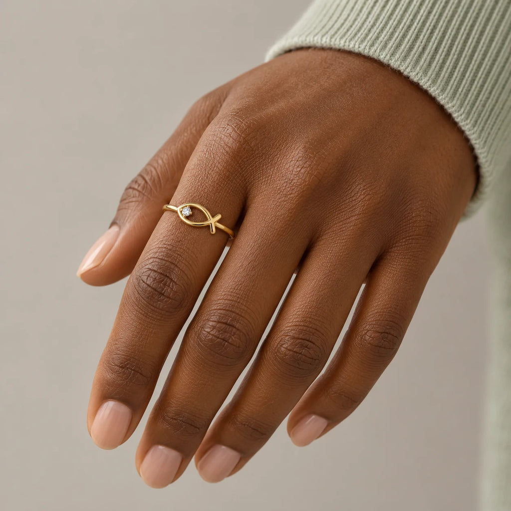 Sacred Ichthys Ring - lifestyle gold hand