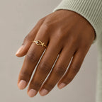 Sacred Ichthys Ring - lifestyle gold hand