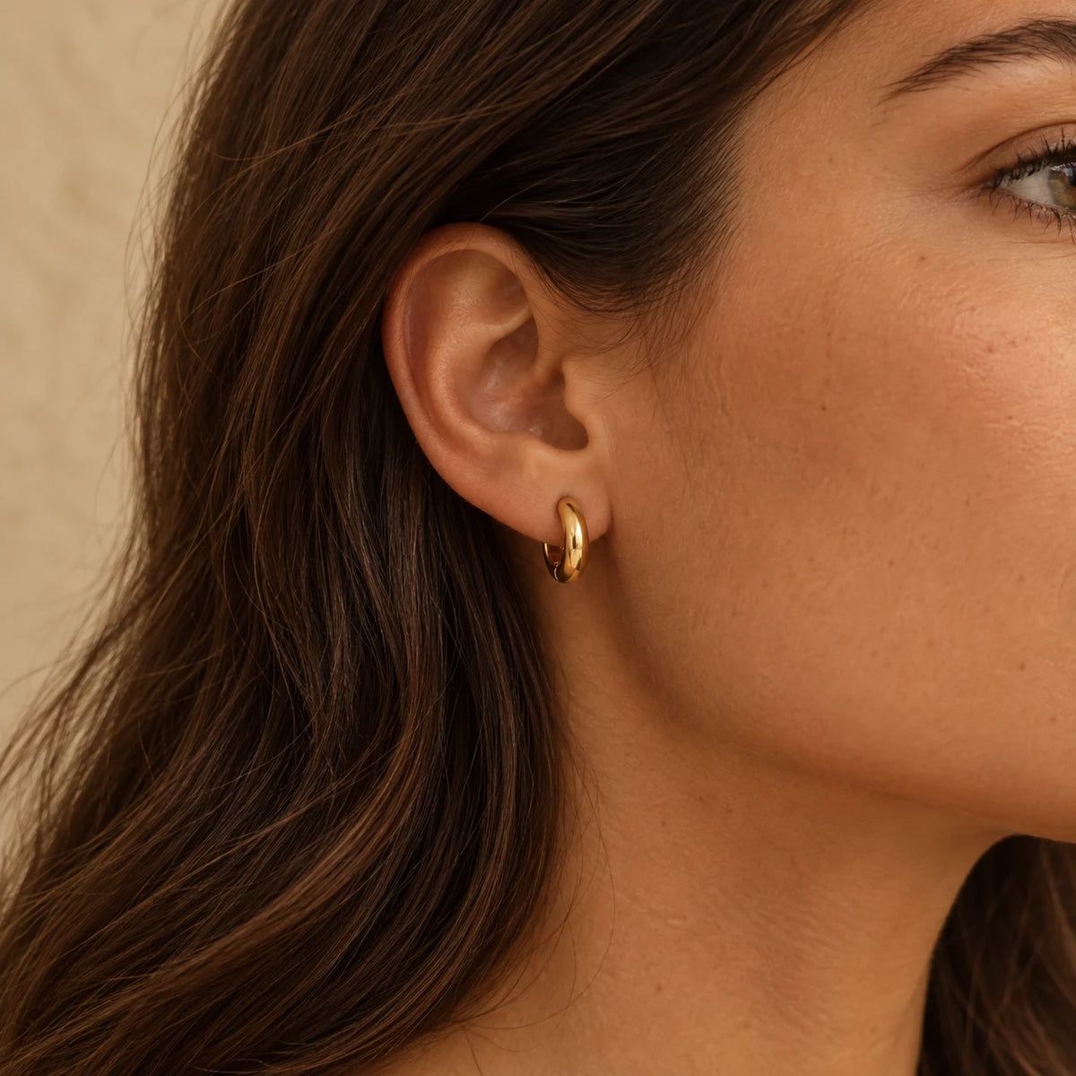 Sculpted Dome Huggie Hoops - lifestyle gold ear
