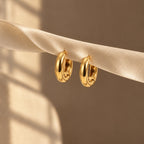 Sculpted Dome Huggie Hoops - lifestyle gold ribbon