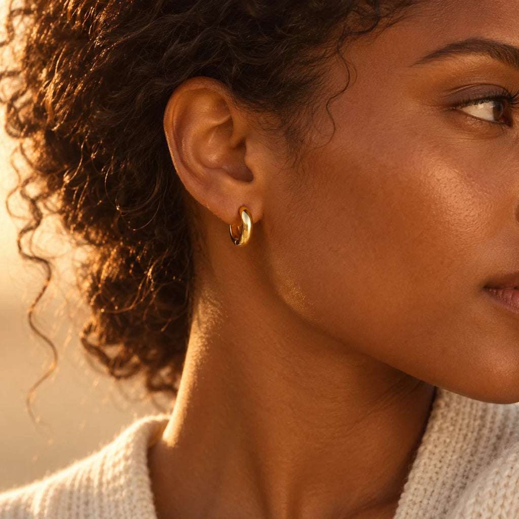 Sculpted Dome Huggie Hoops - lifestyle gold sunset
