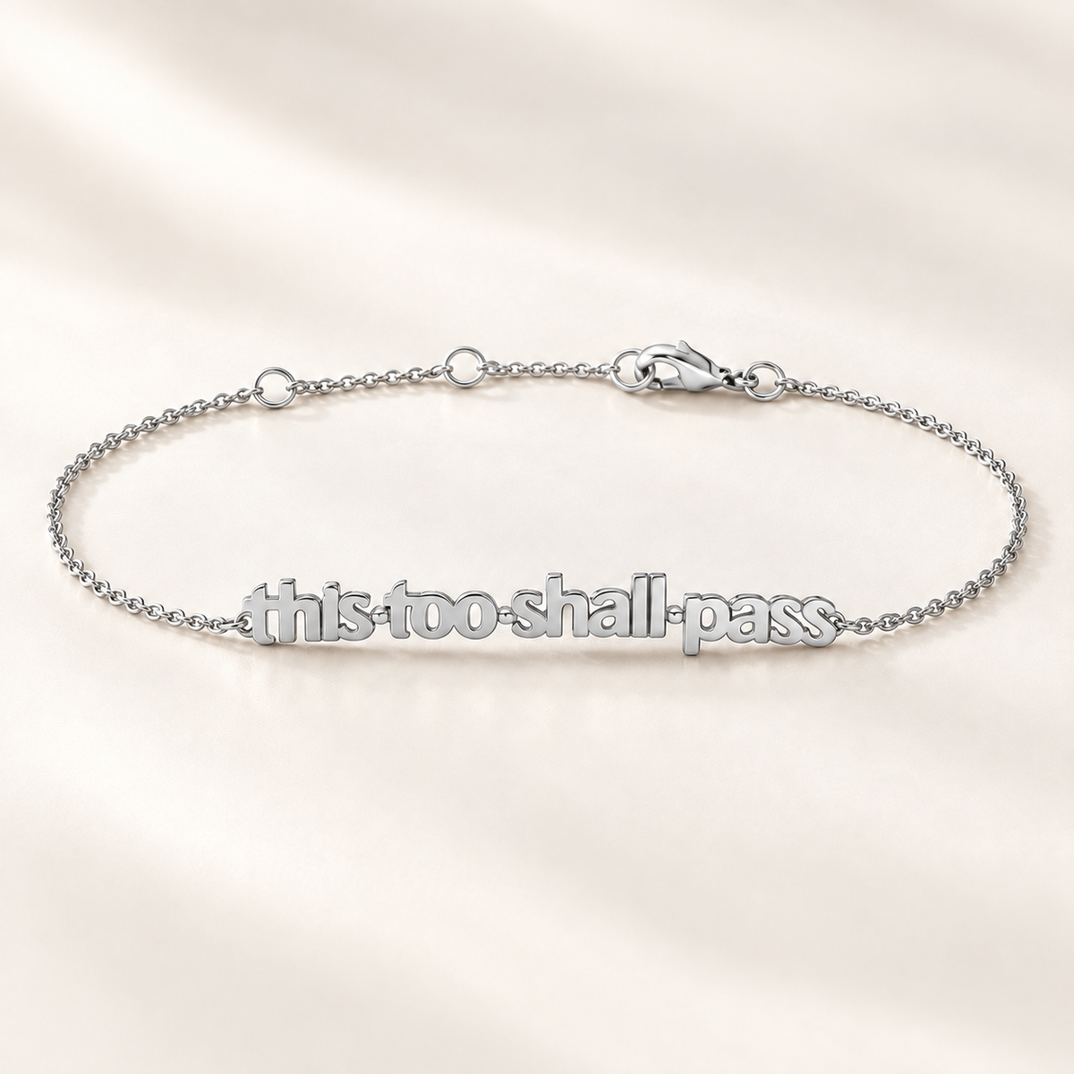 Silver This Too Shall Pass Letter Bracelet on white