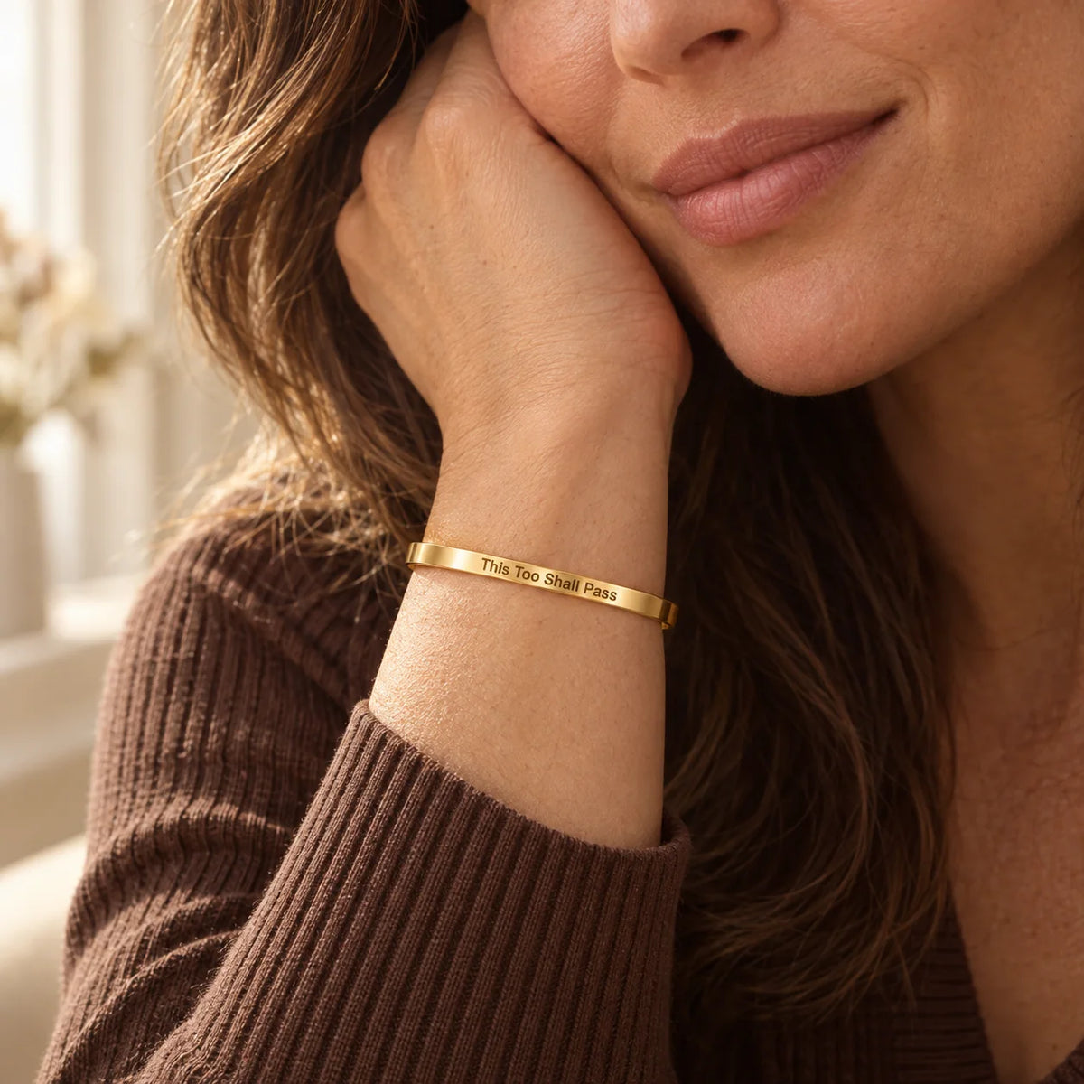 Gold This Too Shall Pass Slim Cuff with outside engraving worn near the face