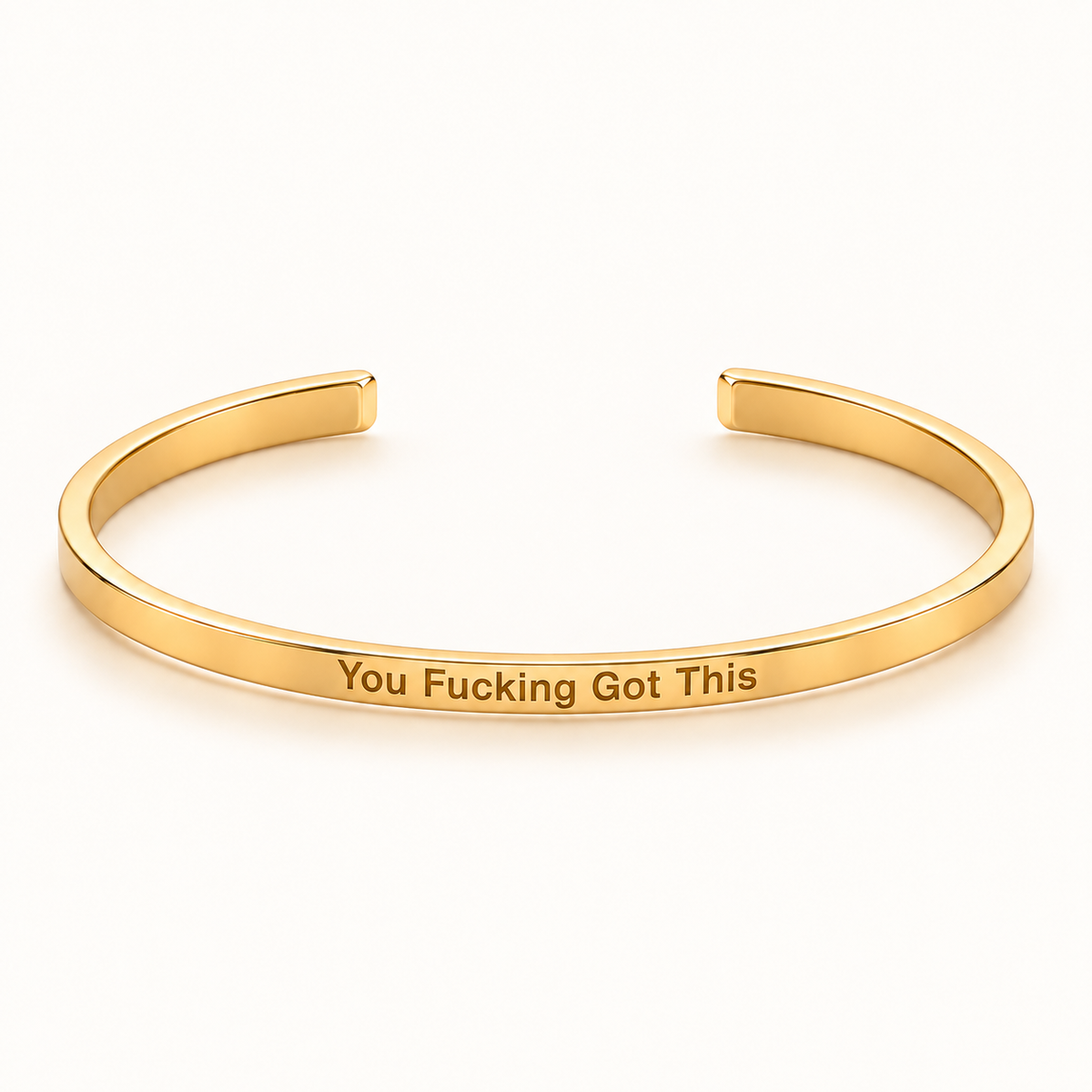 Gold open Slim Cuff with You Fucking Got This engraved on the outside