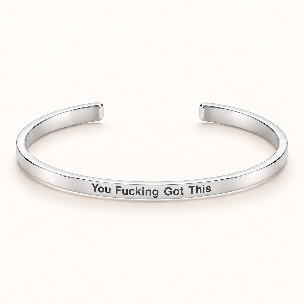 Silver open Slim Cuff with You Fucking Got This engraved on the outside
